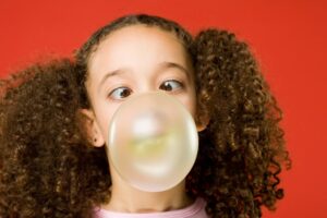 Orthodontist Dr. Kevin Race at Race Orthodontics explains the health risks associated with chewing and swallowing gum in Brookfield and Mukwonago WI